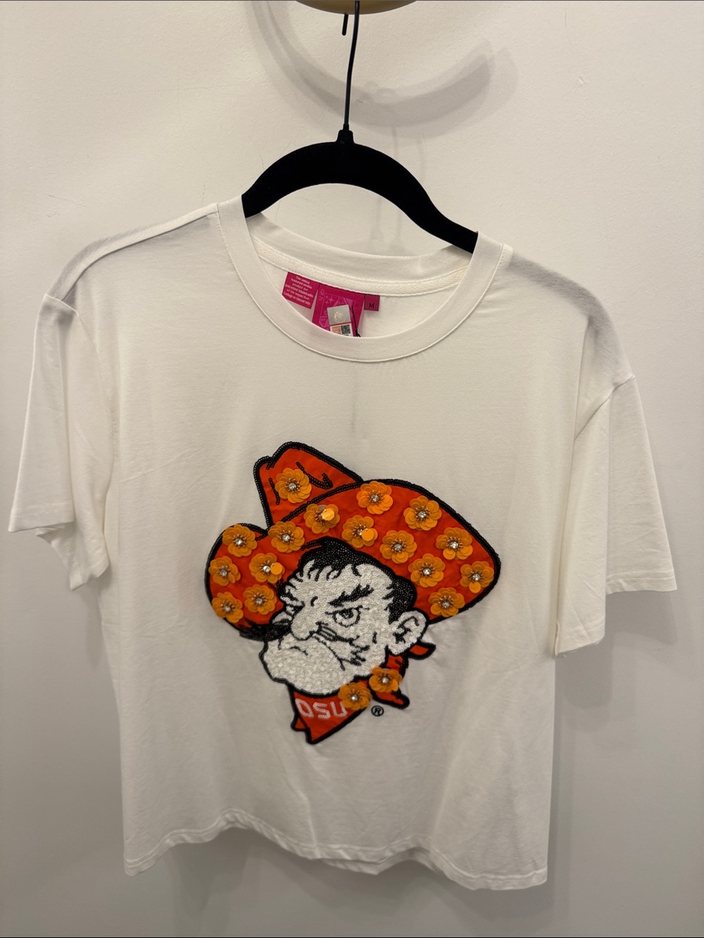QUEEN OF SPARKLES White Tee with Orange Floral Cowboy Graphic